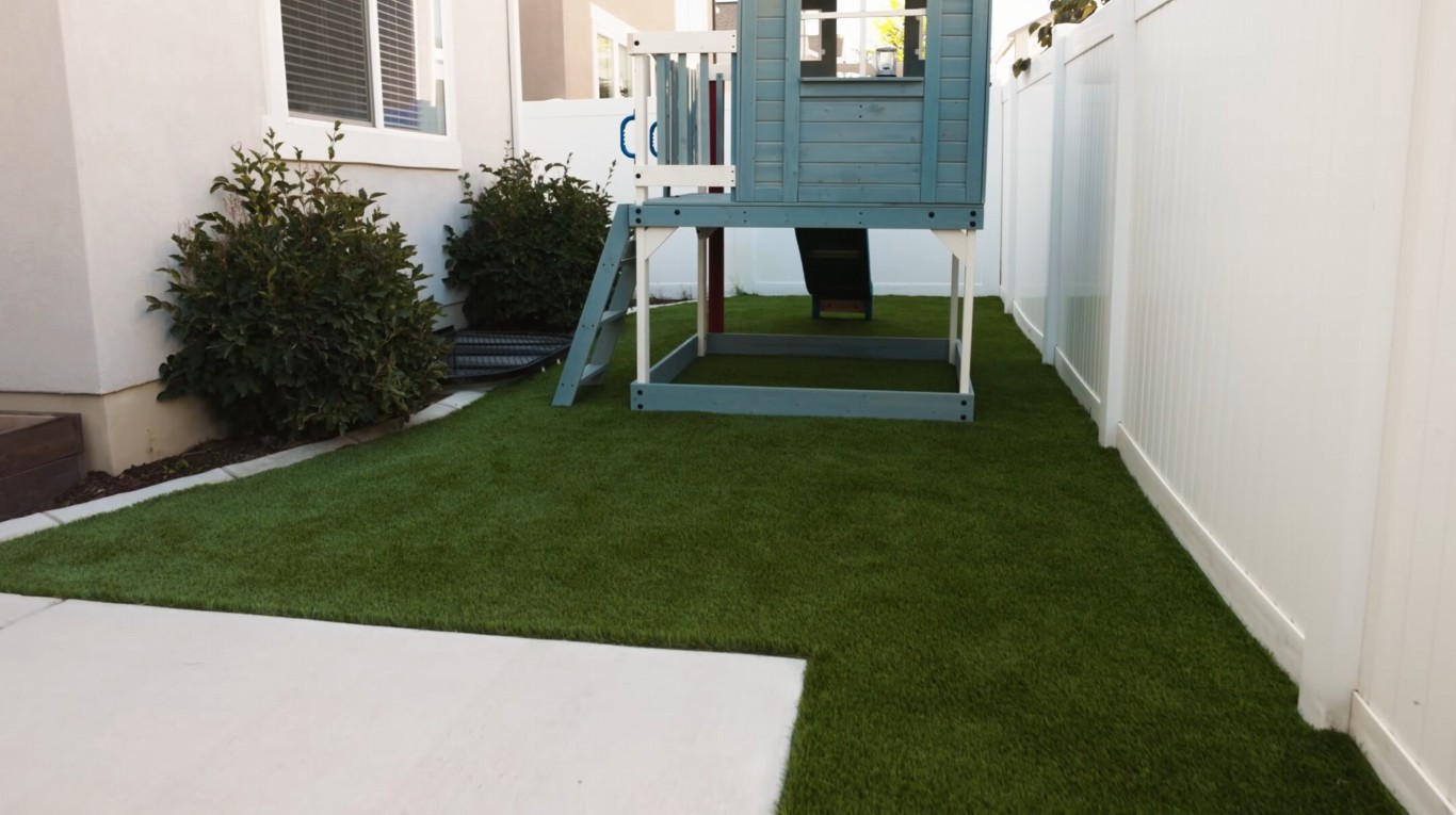 Residential artificial grass installation in Porterville backyard